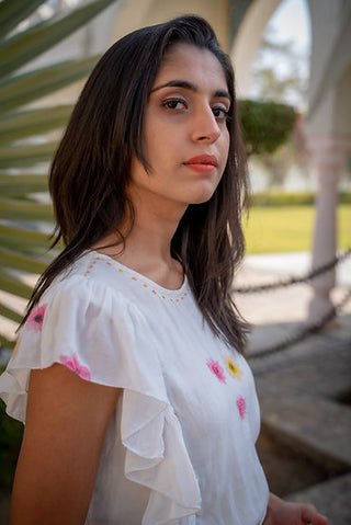 White and pink frill top