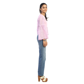 Delicate pink top with bell sleeves side view