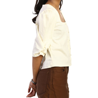 Cute beige puffed sleeves top side view