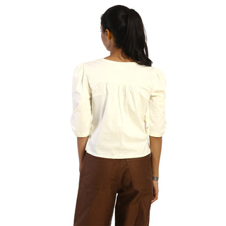 Cute beige puffed sleeves top back view